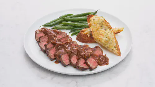 Pan Seared French Onion Steak with Cheesy Garlic Baguette Image 