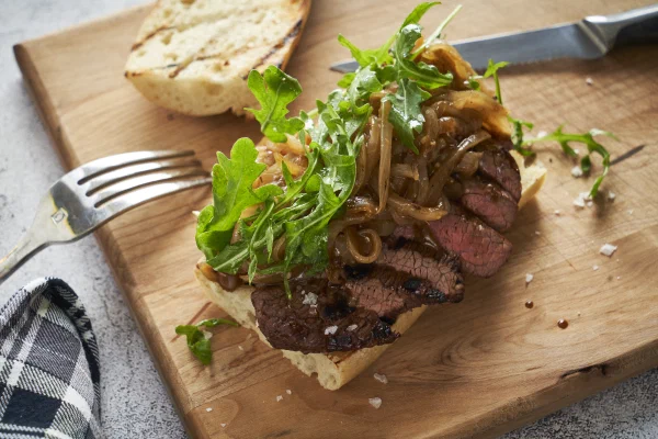 Outside Round Marinating Steak Grilled Steak & Melted Onion Sandwich